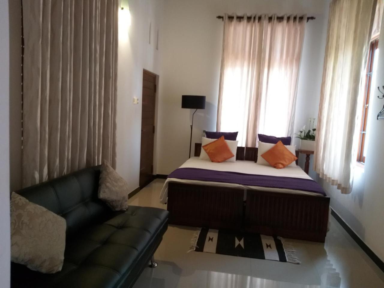 Cosy Nest Home Stay Negombo Phòng bức ảnh